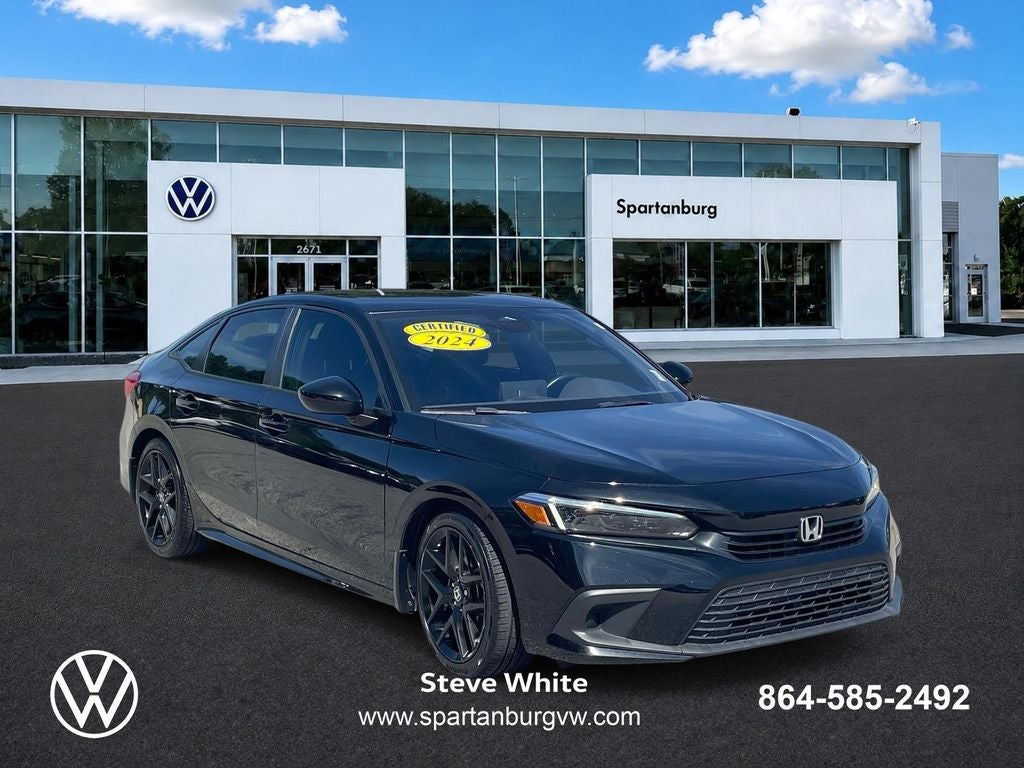 2024 Honda Civic Sport in Crystal Black Pearl — front three-quarter view