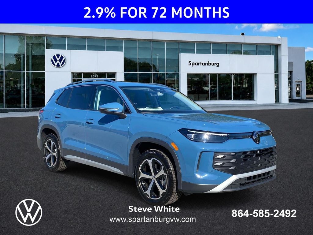 2026 Volkswagen Tiguan 2.0T SE in Monterey Blue Pearl — front three-quarter view