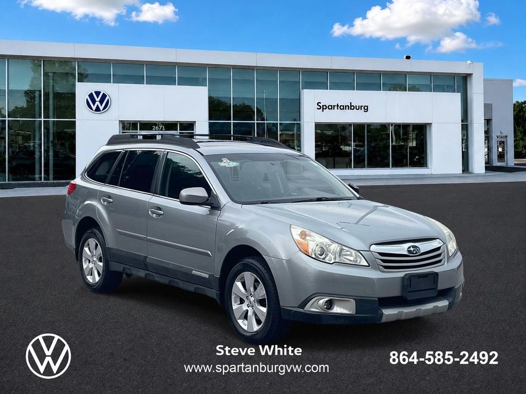 2011 Subaru Outback 2.5i Limited in Steel Silver Metallic — front three-quarter view