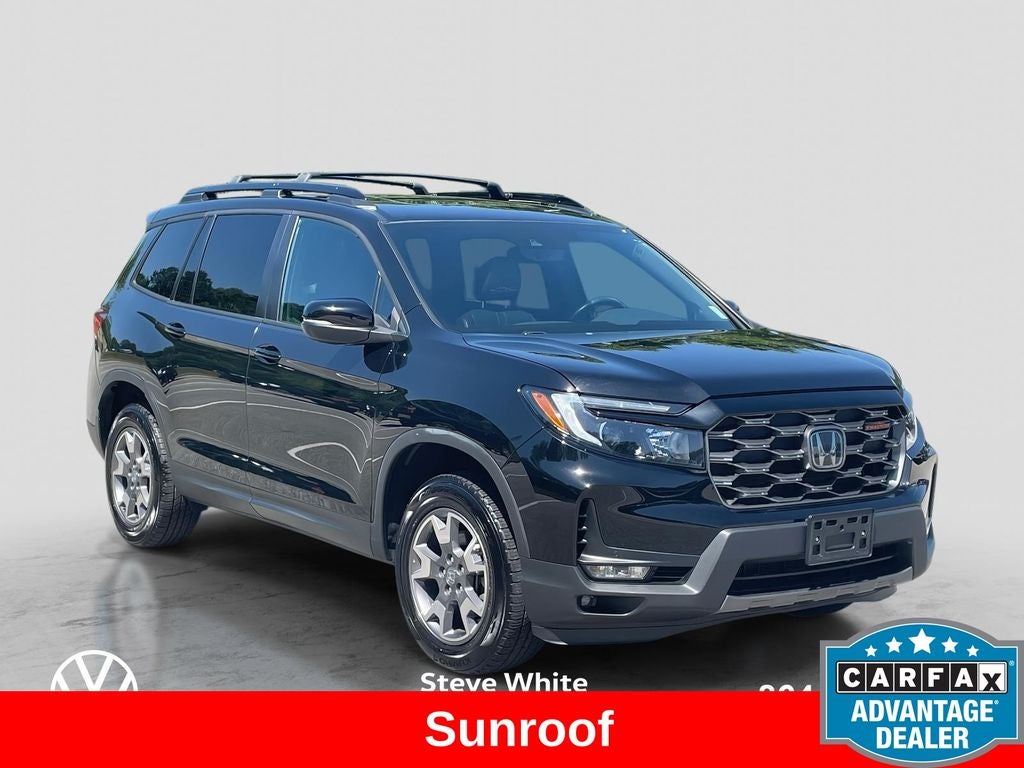 2023 Honda Passport TrailSport in Crystal Black Pearl — front three-quarter view